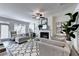 Bright living room featuring modern furnishings, a cozy fireplace, and neutral decor at 2704 Ne Almand Ln, Conyers, GA 30013