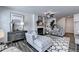 Bright living room featuring a modern fireplace, stylish decor, and comfortable seating arrangement at 2704 Ne Almand Ln, Conyers, GA 30013