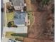 A captivating aerial view showcases the home's backyard and the surrounding neighborhood at 4126 Dream Catcher Dr, Woodstock, GA 30189