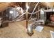 Unfinished attic space featuring wooden beams, ductwork, and plywood flooring at 4126 Dream Catcher Dr, Woodstock, GA 30189