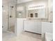 Beautiful new bathroom featuring a walk in shower and double sink vanity at 4126 Dream Catcher Dr, Woodstock, GA 30189