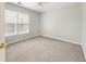 Cozy bedroom with ceiling fan, closet, and natural lighting at 4126 Dream Catcher Dr, Woodstock, GA 30189