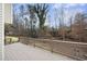 Relaxing outdoor deck offering a peaceful view of the wooded backyard and surrounding nature at 4126 Dream Catcher Dr, Woodstock, GA 30189