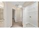 View of the hallway leading to bathroom, bedroom and laundry at 4126 Dream Catcher Dr, Woodstock, GA 30189
