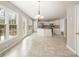 Large open kitchen with stainless appliances, center island, and eat in breakfast area at 4126 Dream Catcher Dr, Woodstock, GA 30189