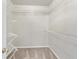 Spacious walk-in closet with ample shelving for optimal organization and storage at 4126 Dream Catcher Dr, Woodstock, GA 30189