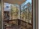 Private deck showcasing a wooded backyard at 1272 Creekside Se Ter, Smyrna, GA 30082