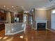 Open concept living room and kitchen area featuring hardwood floors and recessed lighting at 1272 Creekside Se Ter, Smyrna, GA 30082