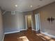 Spacious living room with wood floors, neutral walls, and ample natural light at 1272 Creekside Se Ter, Smyrna, GA 30082