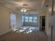 Bright and airy main bedroom with large windows, ceiling fan, and neutral color palette at 1272 Creekside Se Ter, Smyrna, GA 30082