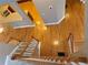 View of the hardwood floors and staircase with carpeted steps from above the second floor at 1272 Creekside Se Ter, Smyrna, GA 30082