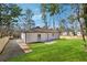 Backyard view of home with lush green grass and a privacy fence at 3482 Atlanta St, Atlanta, GA 30337