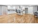 Bright kitchen with white cabinets, granite countertops, stainless steel appliances, and a center island at 3482 Atlanta St, Atlanta, GA 30337