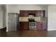 Updated kitchen featuring stainless steel appliances and stylish countertops at 7175 Bowie Dr, Lithonia, GA 30038