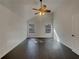 Bright and airy bedroom with ample natural light and hardwood floors at 7175 Bowie Dr, Lithonia, GA 30038