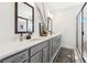 Elegant main bathroom featuring dual sinks, and framed glass shower at 853 Gaston Sw St, Atlanta, GA 30310