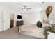 Comfortable main bedroom with neutral colors, soft carpet, and convenient access to other rooms at 853 Gaston Sw St, Atlanta, GA 30310