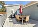 Outdoor patio with a table, chairs, and grill, ideal for enjoying outdoor meals at 853 Gaston Sw St, Atlanta, GA 30310