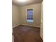 Bedroom with carpet, a window with wood blinds, and a door to the rest of the house at 15 Winterville Dr, Rockmart, GA 30153