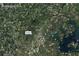 Aerial view showing location of home in Cumming, GA, surrounded by greenery, roads, and local amenities at 2735 Kimblewick Ct, Cumming, GA 30040