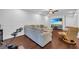 Finished basement featuring a plush sectional sofa, media center and drop ceiling with recessed lighting at 2735 Kimblewick Ct, Cumming, GA 30040