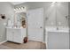 Lovely bathroom featuring double vanities, spacious interior, and great lighting at 2735 Kimblewick Ct, Cumming, GA 30040