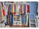 Organized walk-in closet with ample hanging space and shelving at 2735 Kimblewick Ct, Cumming, GA 30040