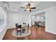 Charming dining room featuring seating for four, wood-look floors, and natural light at 2735 Kimblewick Ct, Cumming, GA 30040