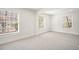 Large bedroom with hardwood floor and multiple windows with views at 291 Lamplighter Se Ln, Marietta, GA 30067