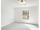 Bright bedroom with neutral carpet, ceiling fan, and window view at 291 Lamplighter Se Ln, Marietta, GA 30067