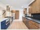 Spacious kitchen with stainless steel appliances, blue island, and modern fixtures at 291 Lamplighter Se Ln, Marietta, GA 30067