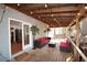 Outdoor deck area with patio furniture and string lights, perfect for entertaining at 671 Benson Hurst Sw Dr, Mableton, GA 30126