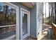 Back porch area with outdoor access, siding, and natural light at 671 Benson Hurst Sw Dr, Mableton, GA 30126