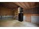 Unfinished basement providing space and the potential for storage or customization, with stairs leading to an upper level at 671 Benson Hurst Sw Dr, Mableton, GA 30126