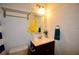 Bright bathroom features a marble sink, decorative mirror, and a convenient towel rack for added storage and style at 671 Benson Hurst Sw Dr, Mableton, GA 30126