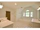 Bright bathroom with double sinks, shower, and a soaking tub at 671 Benson Hurst Sw Dr, Mableton, GA 30126