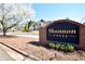Elegant Shannon Chase community sign amidst blooming trees and manicured landscaping for a welcoming entrance at 671 Benson Hurst Sw Dr, Mableton, GA 30126