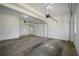 Spacious garage offering plenty of room for parking and storage, with potential for various uses and customization at 671 Benson Hurst Sw Dr, Mableton, GA 30126