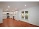 Eat-in kitchen features tile floors, stainless steel appliances, and white cabinets at 671 Benson Hurst Sw Dr, Mableton, GA 30126