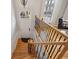 Welcoming entryway with hardwood floors, staircase with wrought iron railings and natural light at 1016 Parkmont Way, Decatur, GA 30033