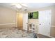 Comfortable carpeted bedroom featuring a ceiling fan and a wall-mounted television at 1049 Fieldstone Dr, Canton, GA 30114