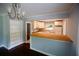 Kitchen with built-in shelving, a breakfast bar and stainless steel appliances at 1624 Beatie Ave, Atlanta, GA 30310