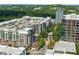 Exterior of apartment building with tree lined street and amenities at 2620 Milford Ln, Alpharetta, GA 30009