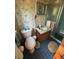 Small bathroom with shower, toilet, and sink at 5169 Oxbow Rd, Stone Mountain, GA 30087