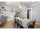 Cozy dining area with hardwood floors and a view of the adjacent updated kitchen at 1015 Michigan Nw Ave, Atlanta, GA 30314
