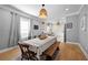 Cozy dining area with hardwood floors and a view of the adjacent updated kitchen at 1015 Michigan Nw Ave, Atlanta, GA 30314