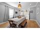Cozy dining room with stylish lighting and ample space for Gathering gatherings at 1015 Michigan Nw Ave, Atlanta, GA 30314