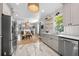 Bright kitchen featuring stainless steel appliances, white cabinetry, and an open concept layout at 1015 Michigan Nw Ave, Atlanta, GA 30314