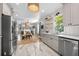 Bright, updated kitchen featuring stainless steel appliances, shaker cabinets and hexagon tile floors at 1015 Michigan Nw Ave, Atlanta, GA 30314