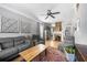 Cozy living room with original fireplace and updated features, bathed in natural light at 1015 Michigan Nw Ave, Atlanta, GA 30314
